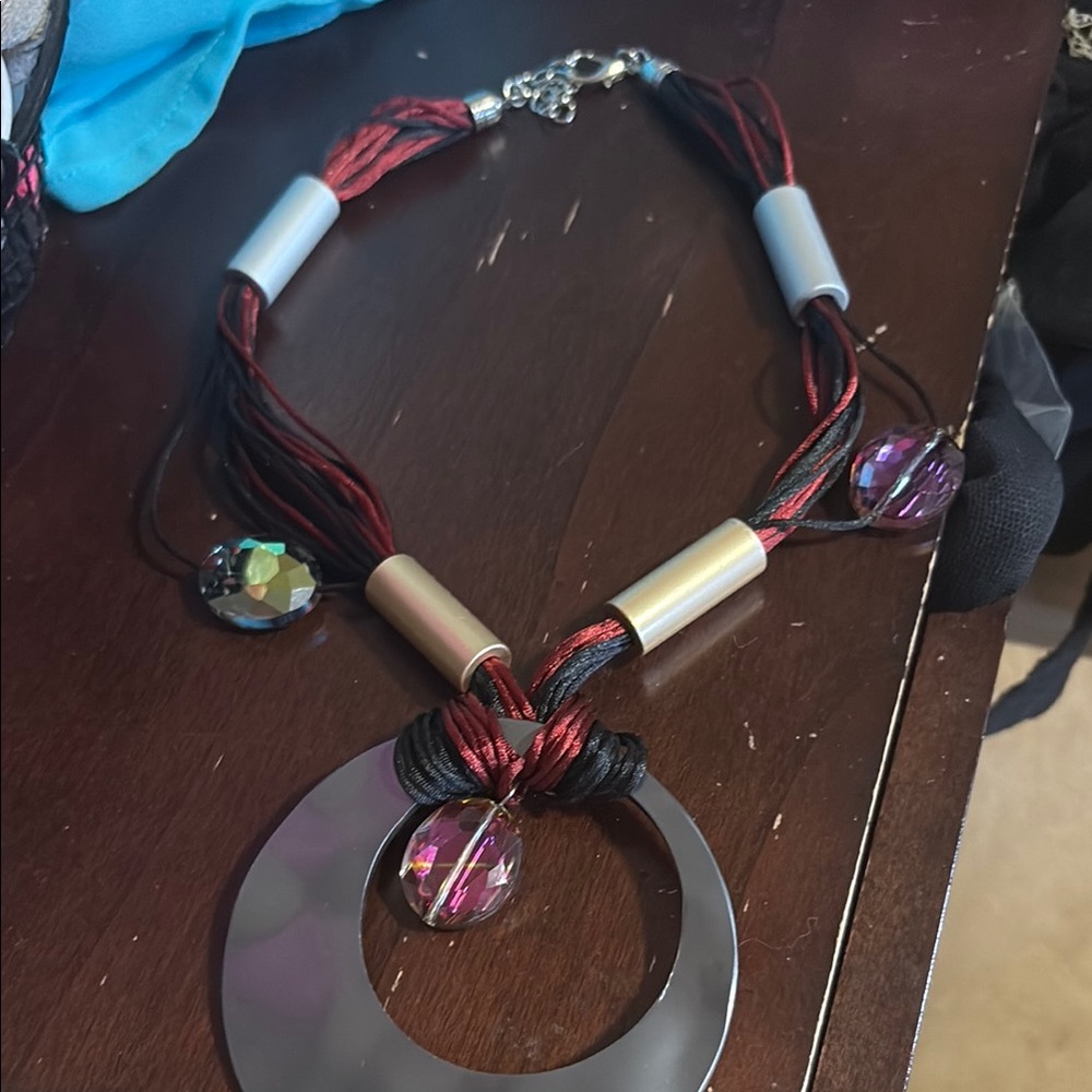 Elegant Black and Red Necklace with Silver Accents